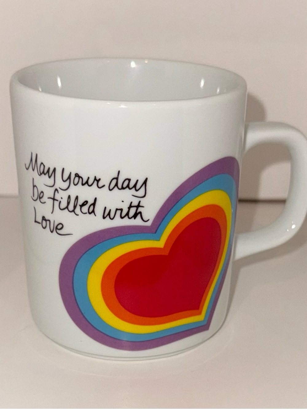 Avon 1983 White Ceramic Mug with Colorful Heart Design